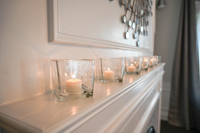 This is a photo of the candles lined up on the mantle in the Illingsworth room.